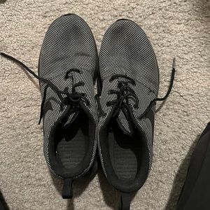 Womens Nike Roshe Black. Used but you can barely tell because they are black!
